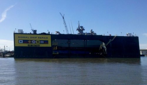 Massive drydocks line the harbor