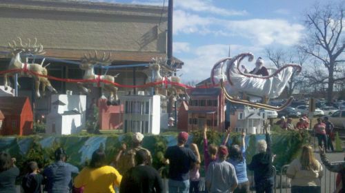 Santa flies over a minature Demopolis