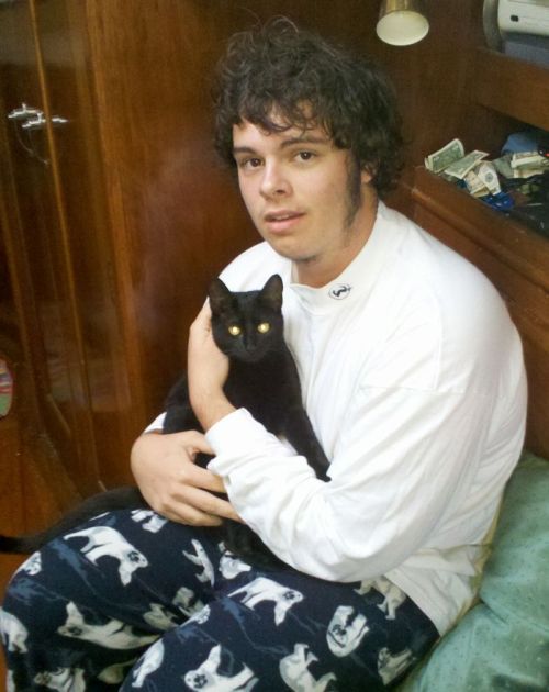 Sparta the kitten with her master, savior and very best friend John.