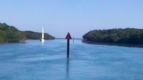 Sailboat coming through one of the many mangrove cuts we traversed today.