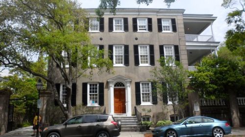Double house, but instead of being a traditional Georgian it has the practical Charleston verandas on the side.
